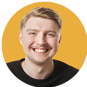 Smiling man with short blonde hair and a mustache, wearing a black shirt, set against a bright yellow circular background, representing satisfied customers of Route 40 Auto's reliable auto repair services.