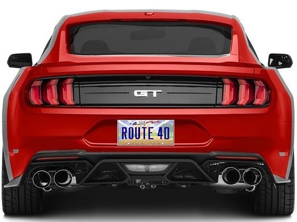 Red sports car with "GT" badge and "ROUTE 40" license plate, showcasing high-performance features and sleek design, relevant to Route 40 Auto's automotive services.