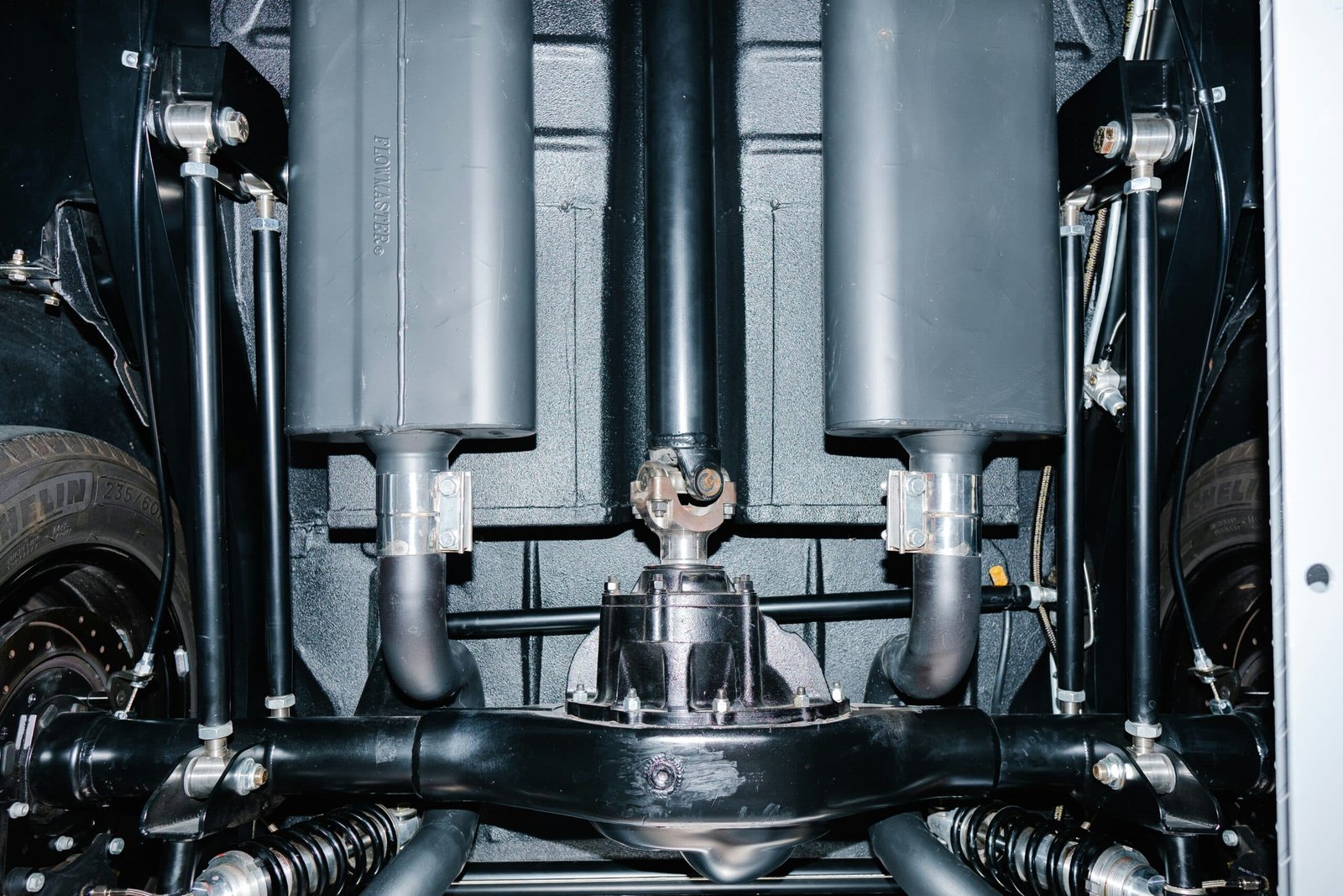 Vehicle exhaust system components and muffler undercarriage view.